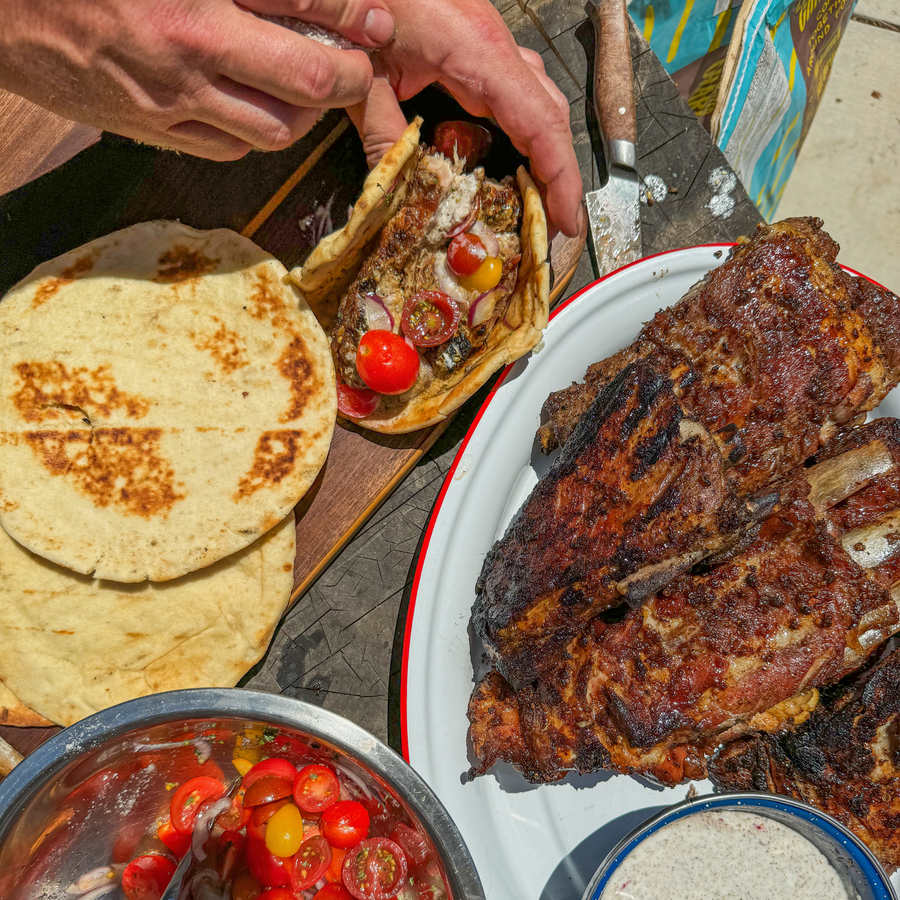 Ribs on grill with pita